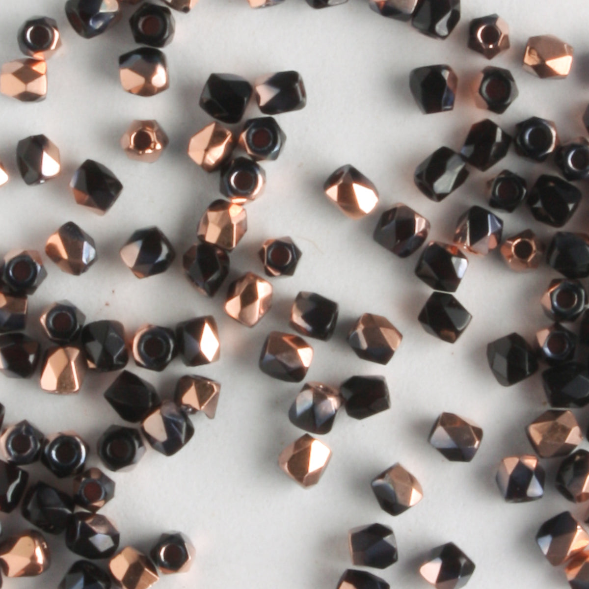 True 2mm Round Fire Polish Jet Capri Gold