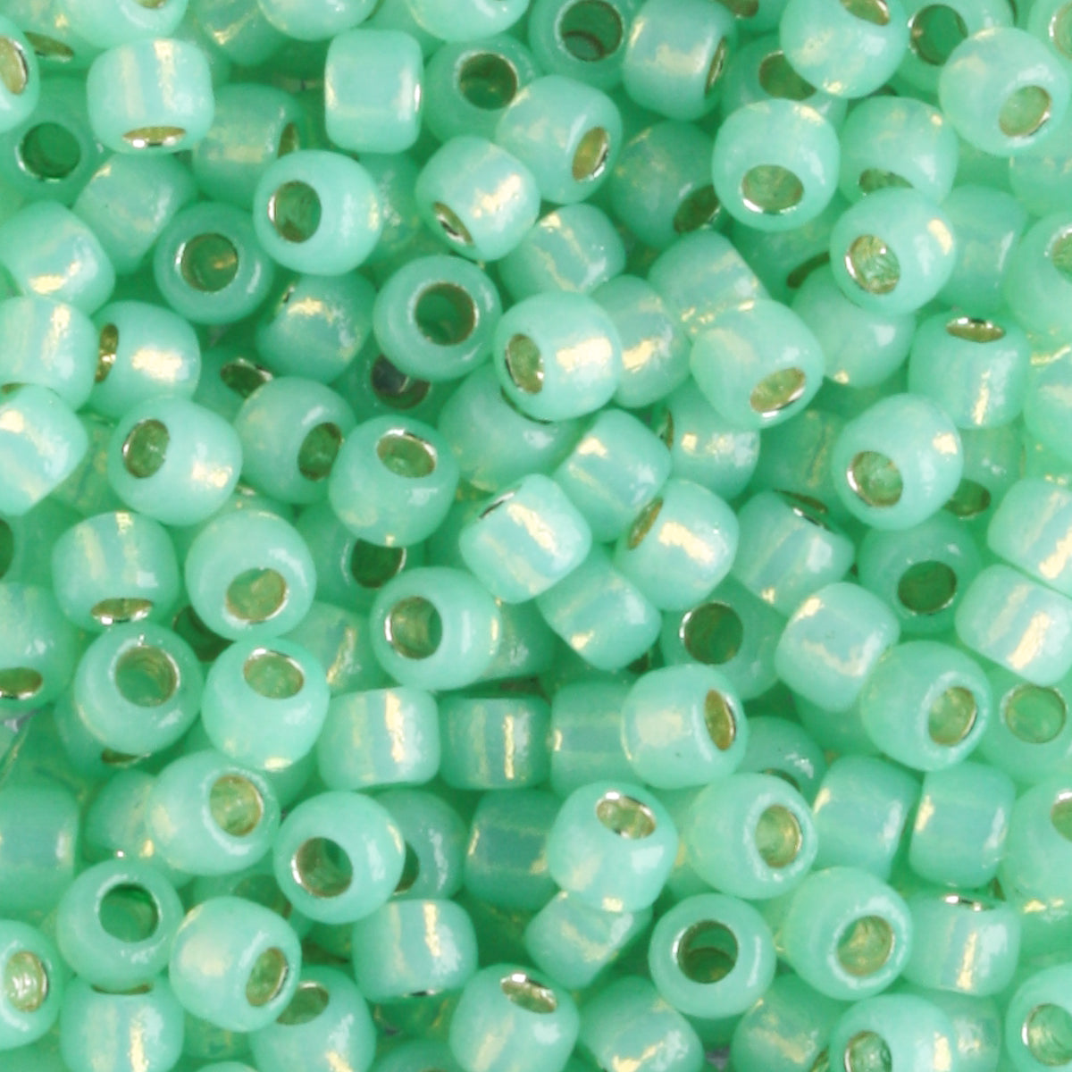 8/0 PermaFinish Silver Lined Milky Peridot - 10 grams