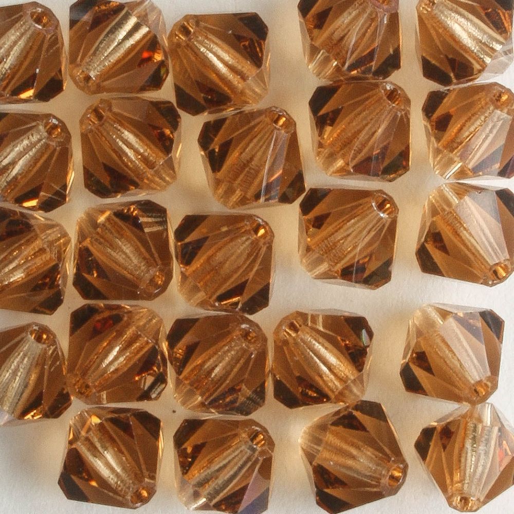 6mm Bicone Light Colorado Topaz - 24 beads