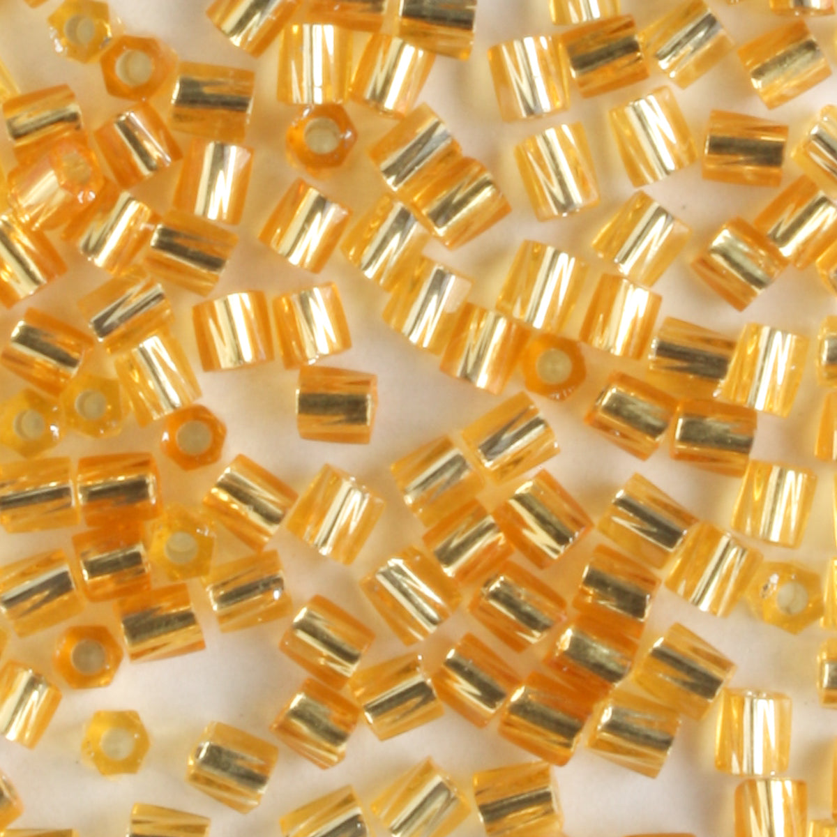 10/0 Hex Cut with a Twist Silver Lined Gold - 10 grams