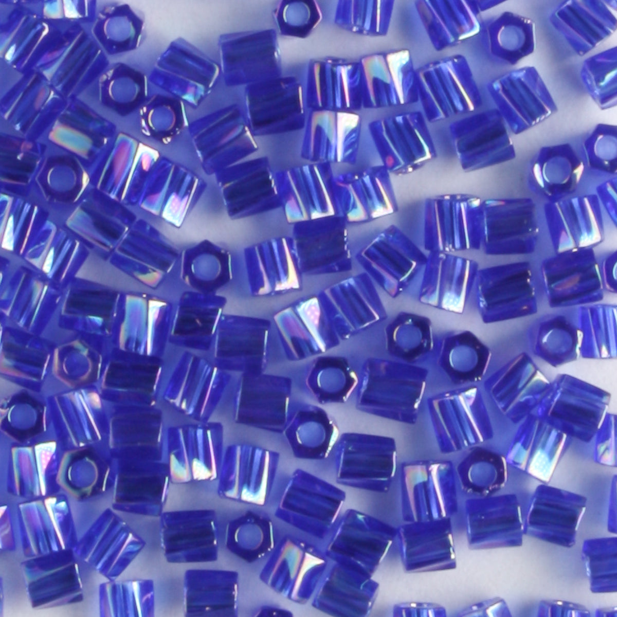 10/0 Hex Cut with a Twist Transparent Rainbow Cobalt Blue - 10 grams