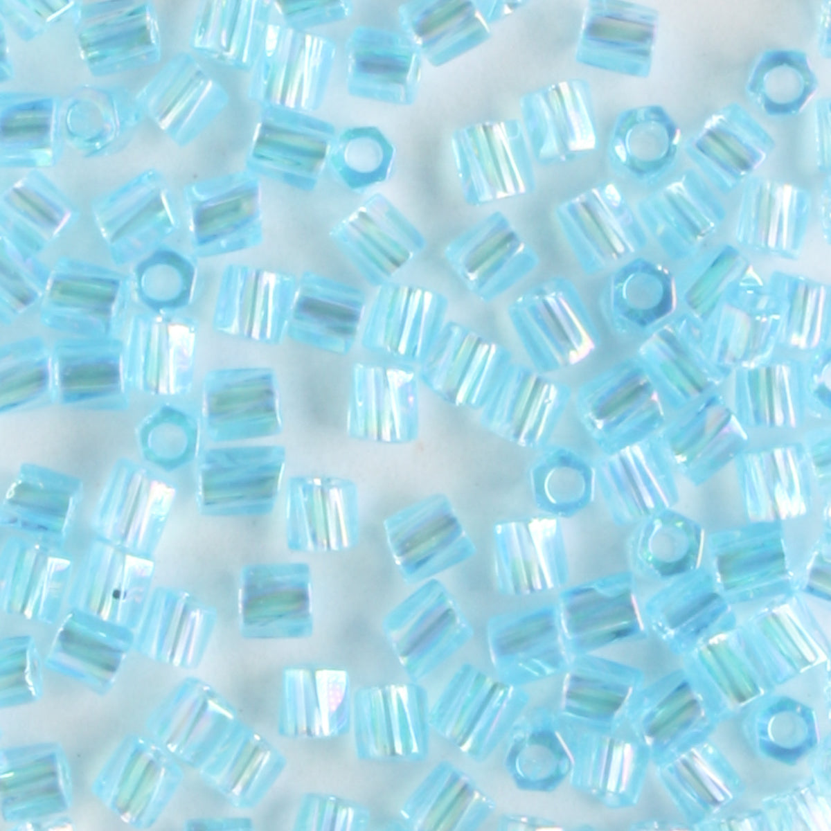 10/0 Hex Cut with a Twist Transparent Rainbow Blue Topaz - 10 grams