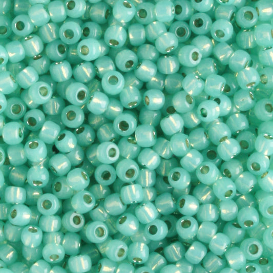 11/0 PermaFinish Silver Lined Milky Dark Peridot - 10 grams