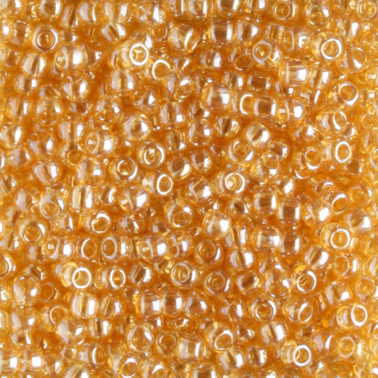 11/0 Transparent Luster Light Topaz - 10 grams