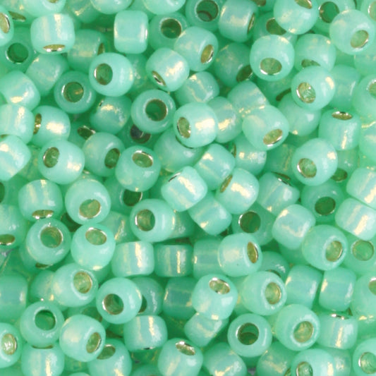 8/0 PermaFinish Silver Lined Milky Peridot - 10 grams