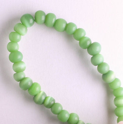 4mm Cat's Eye Glass - 8" strand