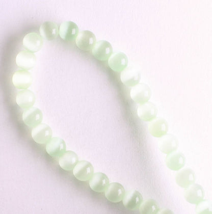4mm Cat's Eye Glass - 8" strand