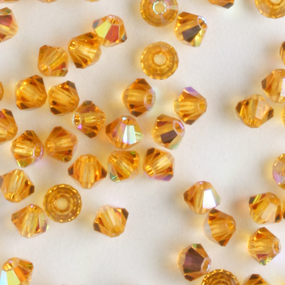 3mm Bicone Topaz AB - 48 beads